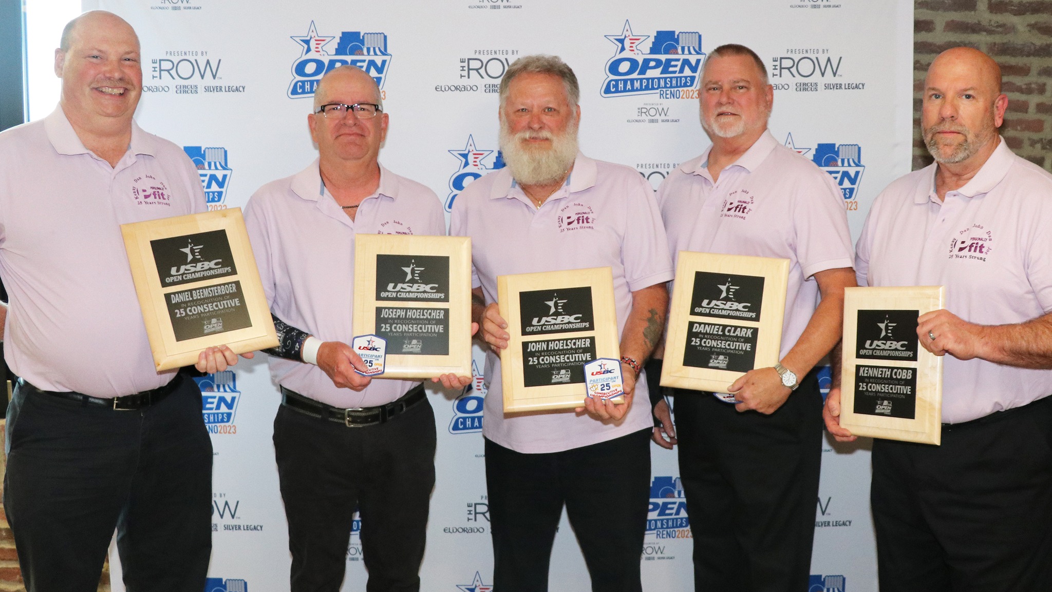The members of PFit 25 with their 25-year plaques at the 2023 USBC Open Championships