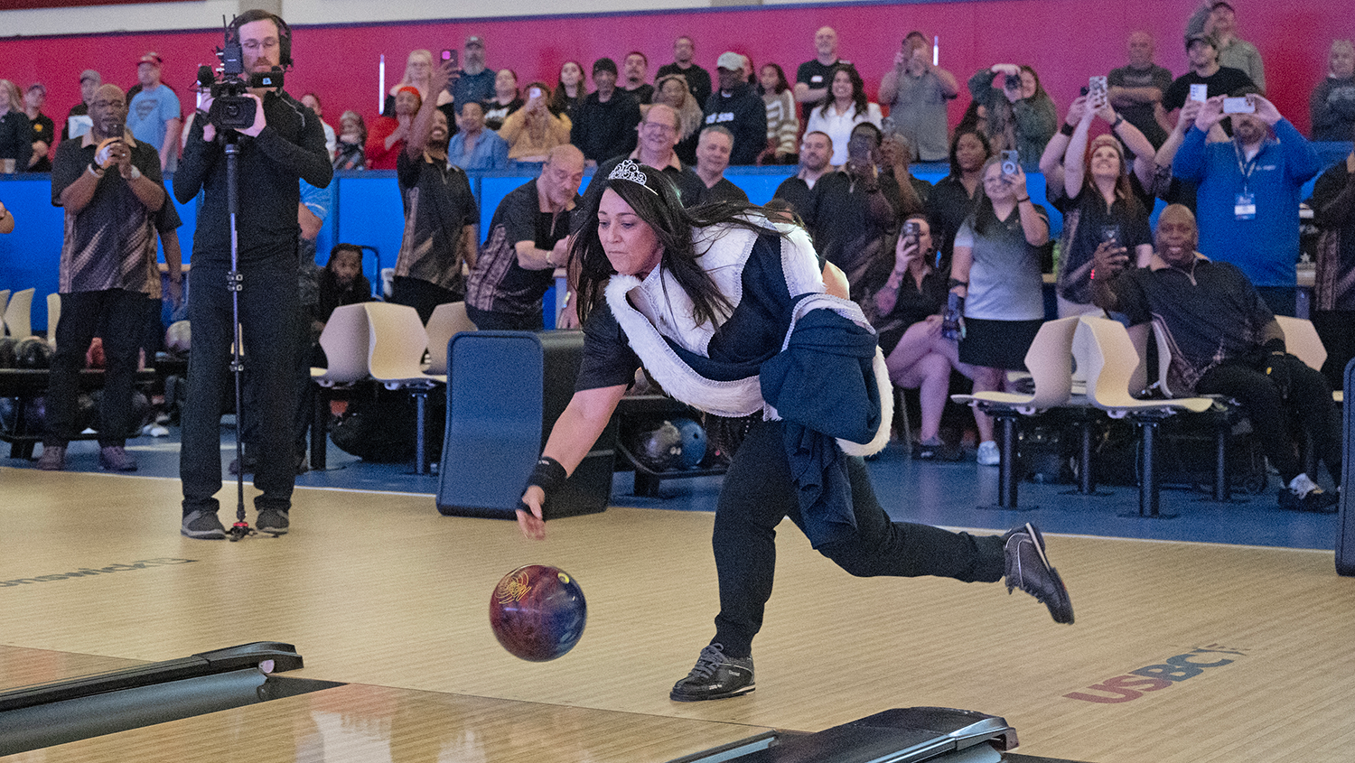 Shellie Camarata rolls the ceremonial first ball of the 2025 USBC Open Championships