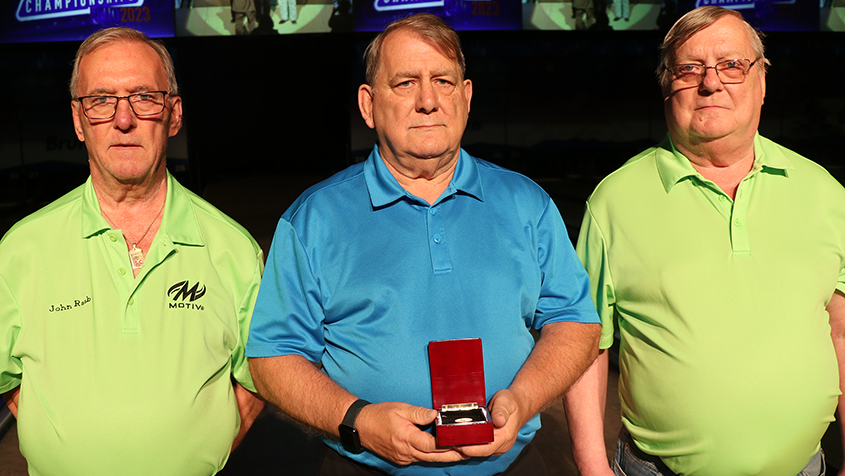 James Raab celebrates his 50th appearance at the USBC Open Championships with his brothers John (left) and Ed (right)