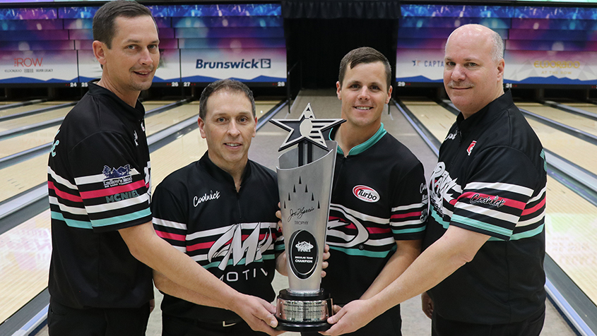 The members of Storm Products Inc. 1 with the Joe Norris Trophy at the 2023 USBC Open Championships