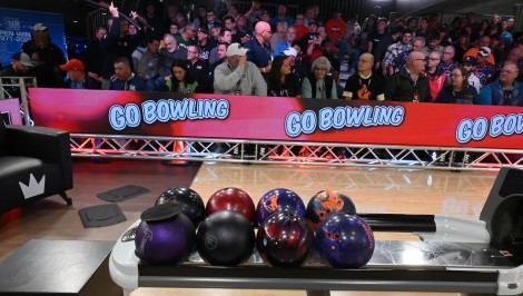 Fans with Go Bowling signs at U.S. Open